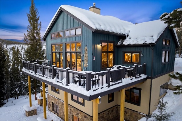 view of snow covered property