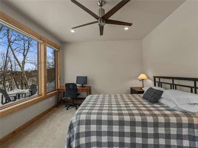 bedroom featuring recessed lighting, baseboards, light colored carpet, and a ceiling fan