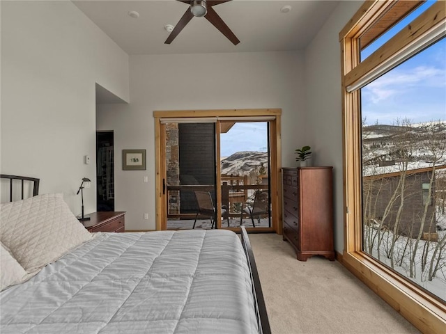 bedroom featuring ceiling fan, carpet flooring, and access to outside