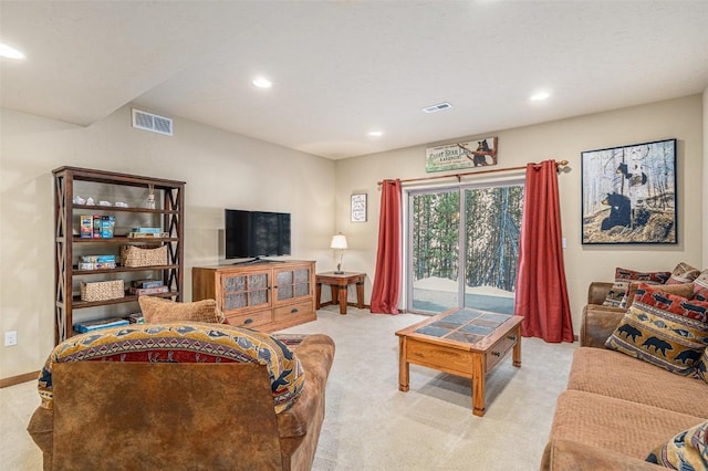 living room featuring light colored carpet