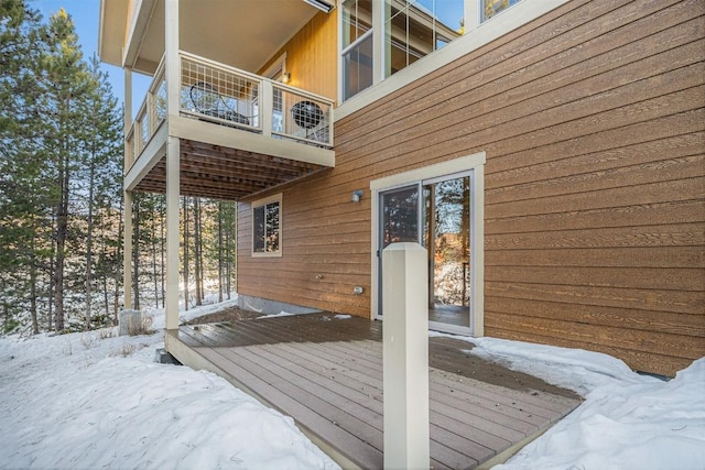 view of snow covered deck