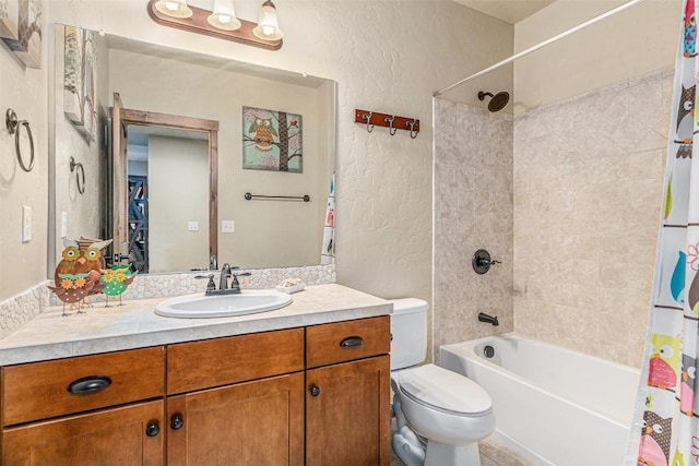 full bathroom featuring shower / bath combination with curtain, vanity, and toilet