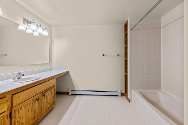 bathroom featuring vanity, baseboard heating, and  shower combination