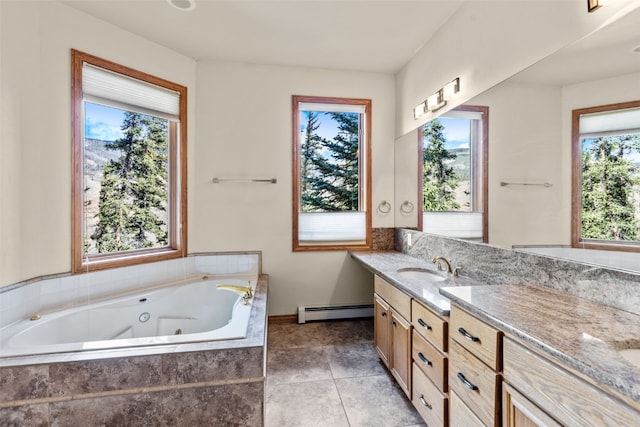 bathroom featuring vanity, baseboard heating, and tiled tub