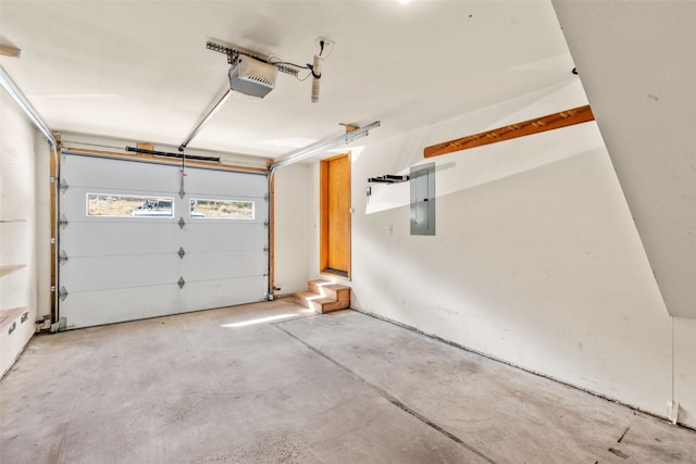 garage featuring electric panel and a garage door opener