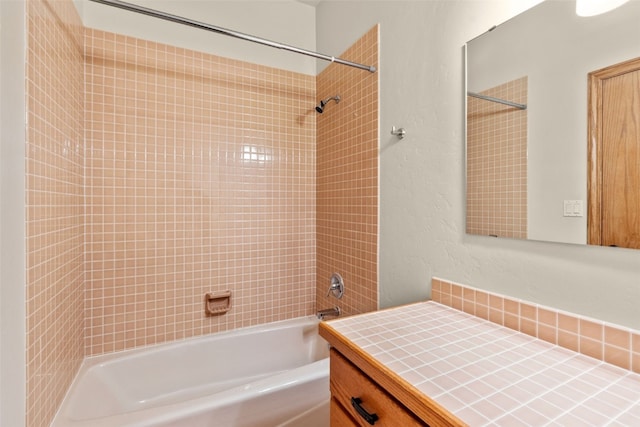 bathroom with vanity and shower / bathtub combination