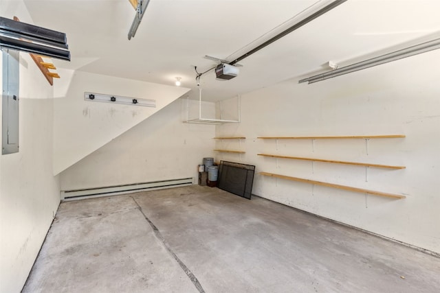 garage with a garage door opener and a baseboard heating unit