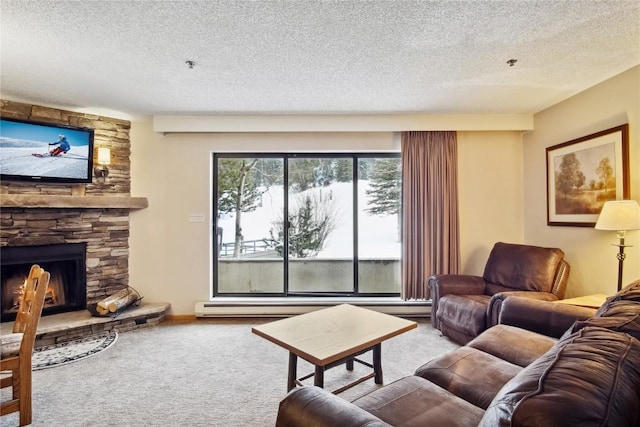 carpeted living room featuring a baseboard heating unit, a fireplace, and a textured ceiling