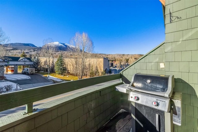 exterior space featuring a mountain view and area for grilling