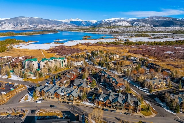 bird's eye view with a water and mountain view