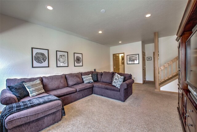 living room featuring light colored carpet