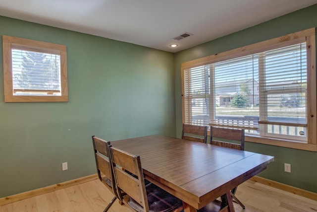 dining area with light wood-type flooring