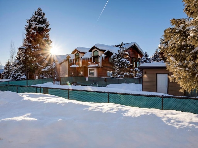 view of snow covered pool