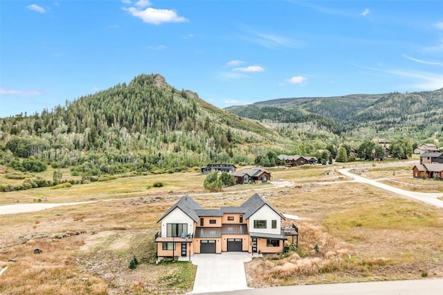 view of mountain feature with a wooded view