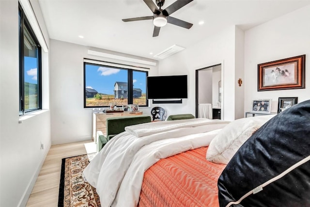 bedroom featuring baseboards, a ceiling fan, light wood-style flooring, and recessed lighting