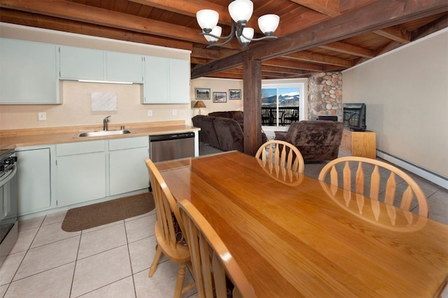 tiled dining space featuring sink, beamed ceiling, wooden ceiling, and a notable chandelier