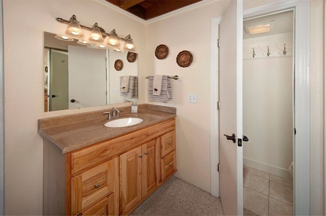 bathroom featuring tile patterned floors and vanity