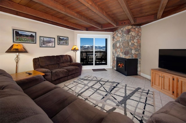 tiled living room featuring a fireplace, beamed ceiling, and wood ceiling