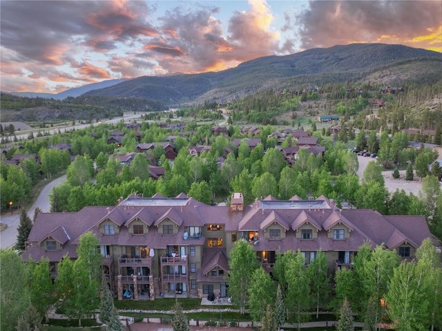 aerial view at dusk with a mountain view