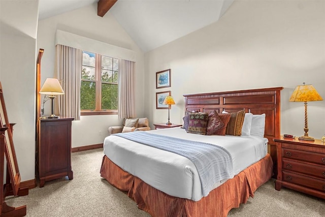 bedroom featuring lofted ceiling with beams and light colored carpet