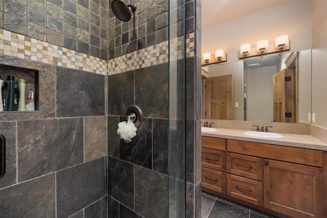 bathroom with vanity and walk in shower