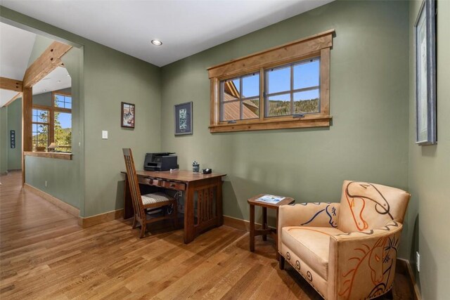 office area with light hardwood / wood-style flooring