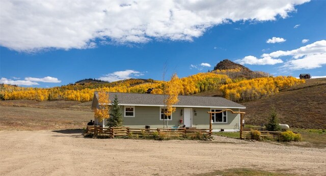 view of front of home with a mountain view