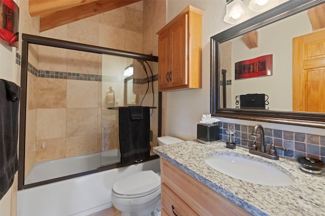 full bathroom with beam ceiling, enclosed tub / shower combo, backsplash, toilet, and vanity