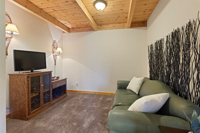 carpeted living room with lofted ceiling with beams and wood ceiling