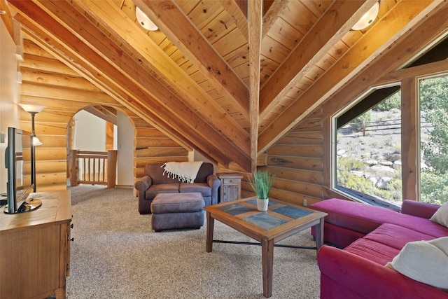 living room with carpet, vaulted ceiling with beams, wood ceiling, and rustic walls