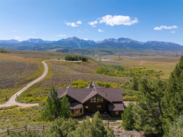 aerial view featuring a mountain view and a rural view