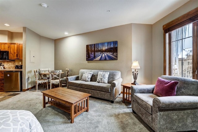 living room with light colored carpet