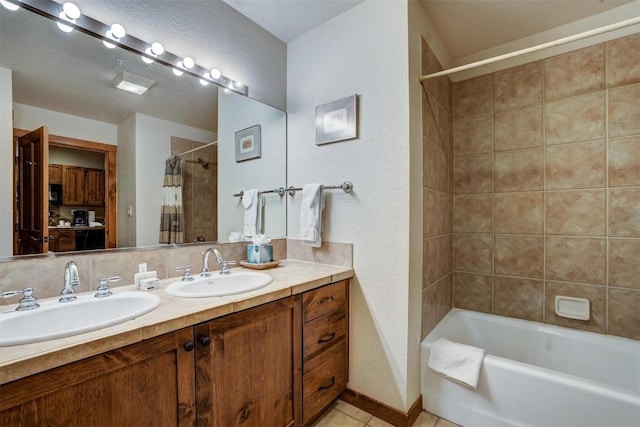 bathroom featuring vanity, tile patterned floors, and shower / tub combo with curtain