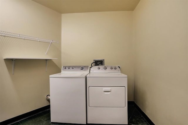 laundry room featuring separate washer and dryer