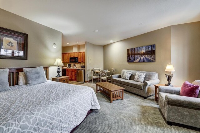 bedroom featuring light colored carpet