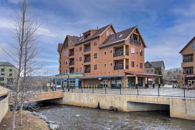 view of building exterior with a water view