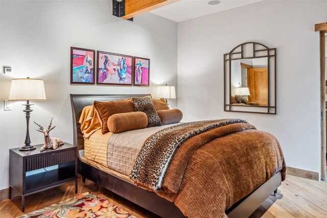 bedroom with light hardwood / wood-style flooring