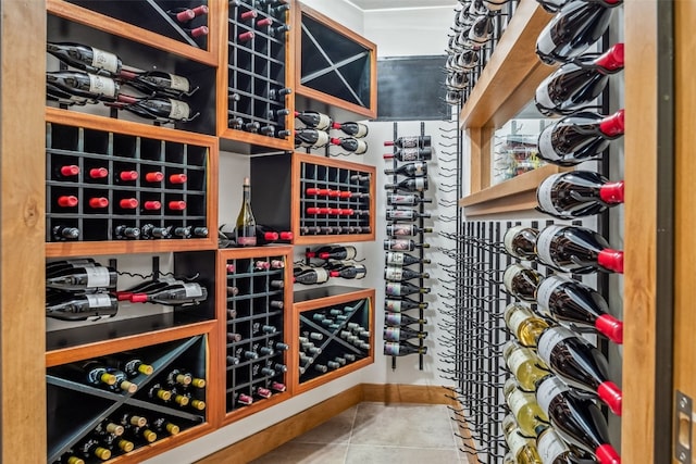 wine area featuring tile patterned flooring