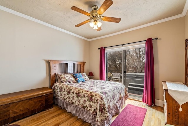 bedroom featuring light wood finished floors, ceiling fan, ornamental molding, access to exterior, and a textured ceiling