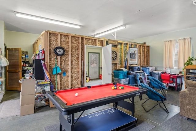 playroom with pool table and concrete floors