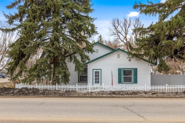 view of side of property with a fenced front yard