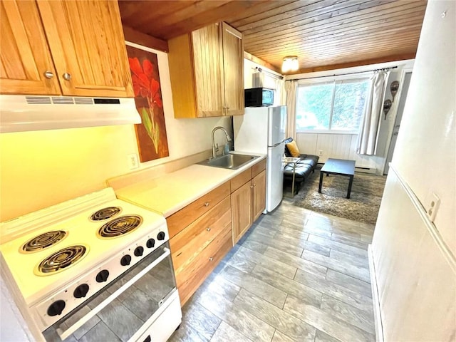 kitchen featuring white appliances, a baseboard heating unit, sink, and wooden ceiling