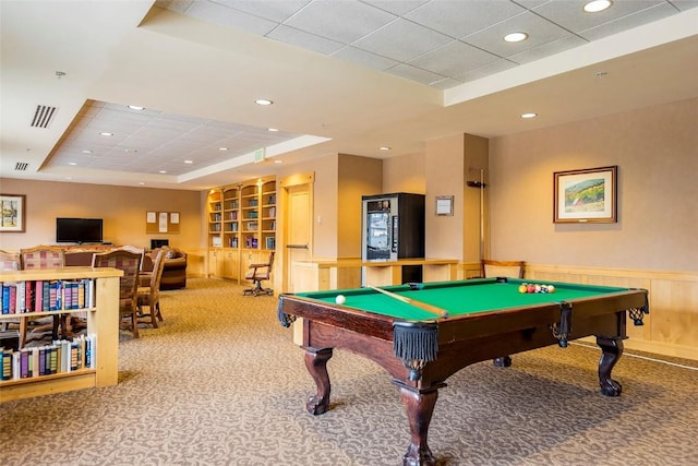 rec room with a raised ceiling, built in features, pool table, and carpet floors