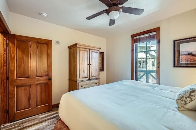 bedroom featuring ceiling fan and light hardwood / wood-style floors