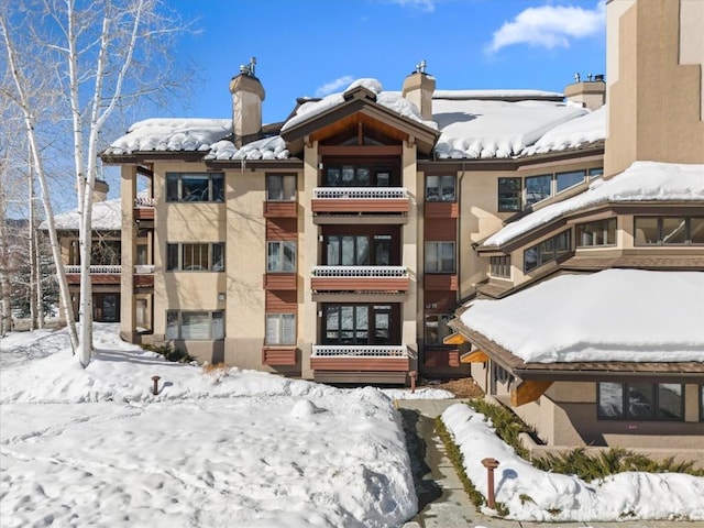 view of snow covered property