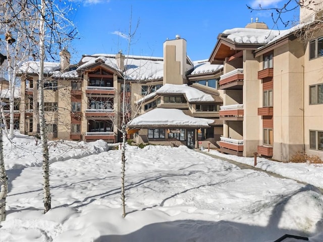 view of snow covered building