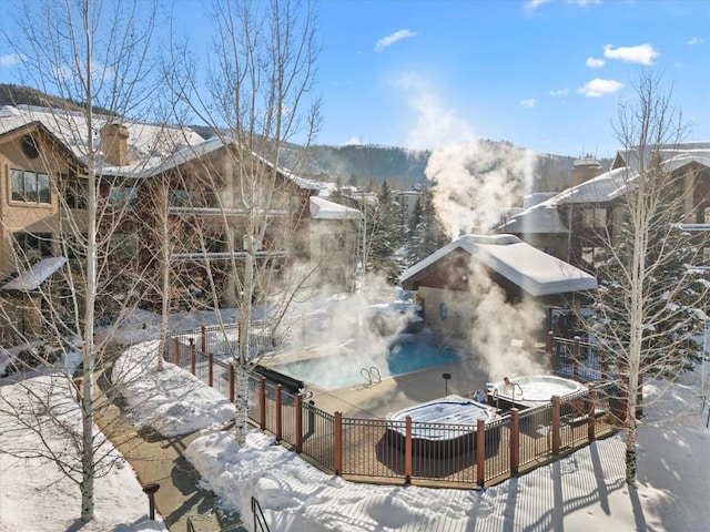 exterior space with a jacuzzi