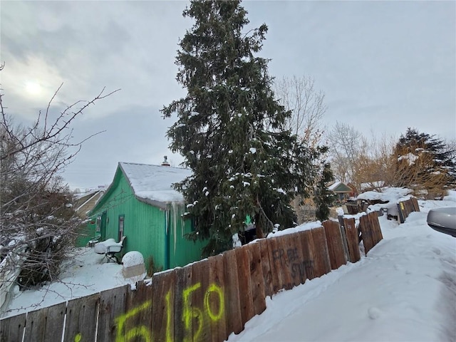 view of snow covered property