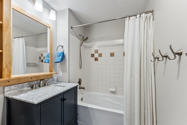 bathroom featuring vanity and shower / tub combo