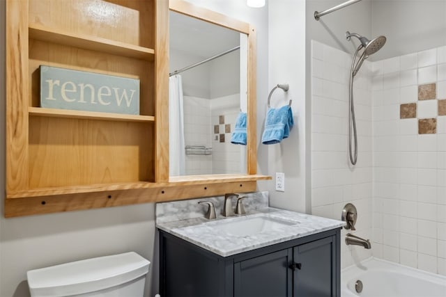 full bathroom with shower / bath combo with shower curtain, toilet, and vanity